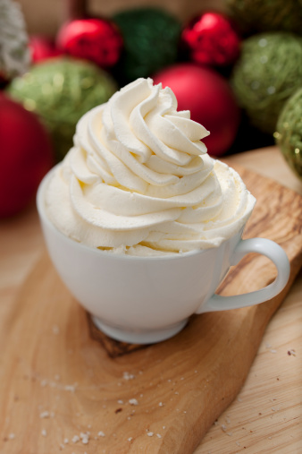 Fresh whipped cream topped christmas drink.