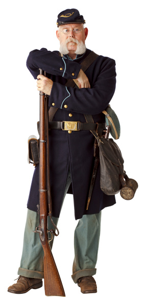 Re-enactor portraying an American Civil War Union Soldier. There are a lot of details in this image.