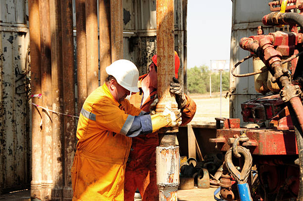 Oil Rig Friends 1,000+ Oil Rig Teamwork Stock Photos, Pictures & Royalty-Free Images ...