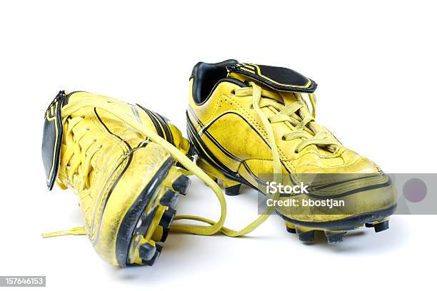 Yellow Soccer Cleats Stock Photo - Download Image Now - Soccer Shoe, Dirty, Sports Shoe