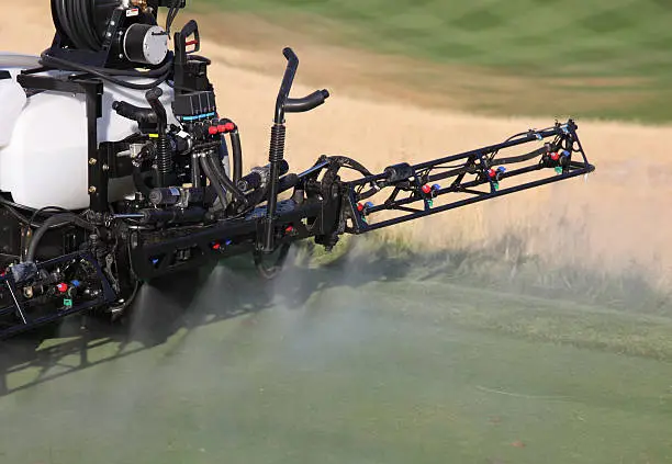 Photo of Spraying Liquid Fertilizer on a Golf Course