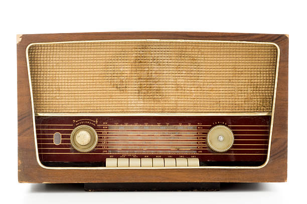 Photo of a brown vintage radio with wooden casing stock photo