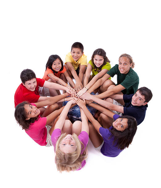 istock Diversity: Children of Different Ethnicities with Hands Together Around Globe 157646365