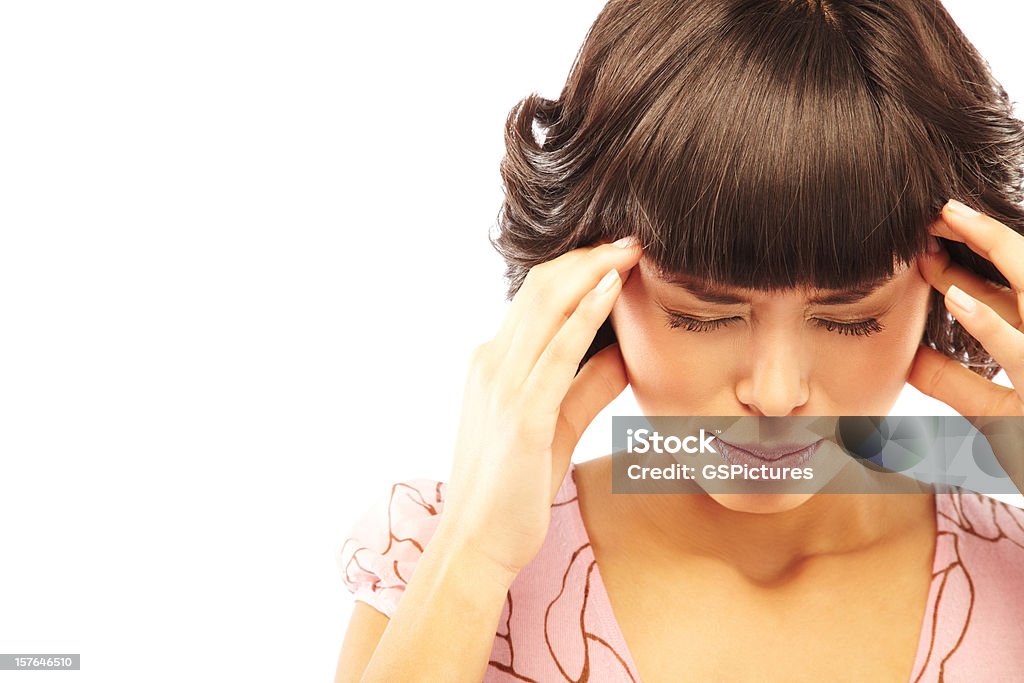 Brunette Frau mit einem Kopfschmerz hält ihr Tempel - Lizenzfrei Frauen Stock-Foto
