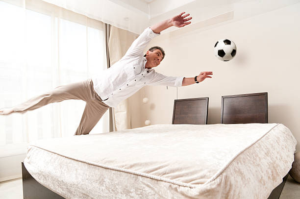 Goalkeeper training in hotel bed room