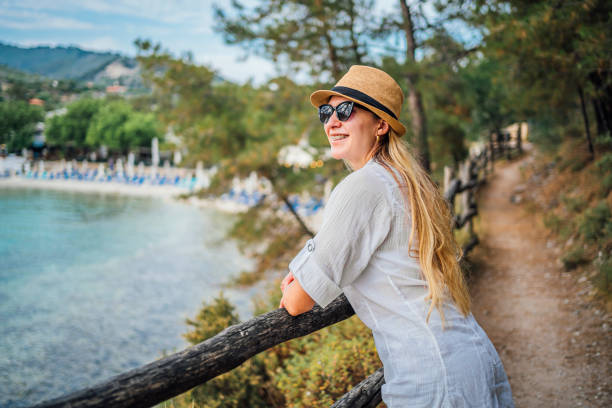 istock Young woman enjoying on vacation 1576467042