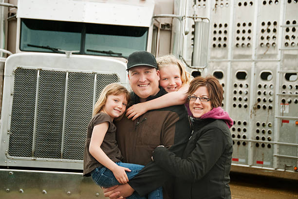 Truck Driver and his Family  blue collar worker stock pictures, royalty-free photos & images