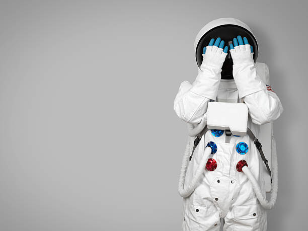 Astronaut hides his face stock photo