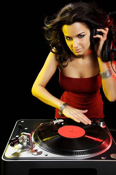 istock Beautiful Brunette DJ With a Turntable 157646829