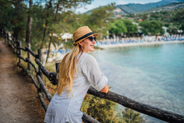 istock Young woman enjoying on vacation 1576469737