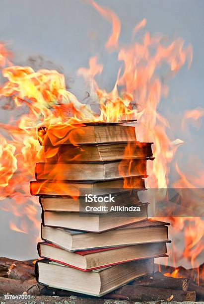 Stack Of Hardcover Burning Books Stock Photo - Download Image Now - Book, Book Burning, Burning