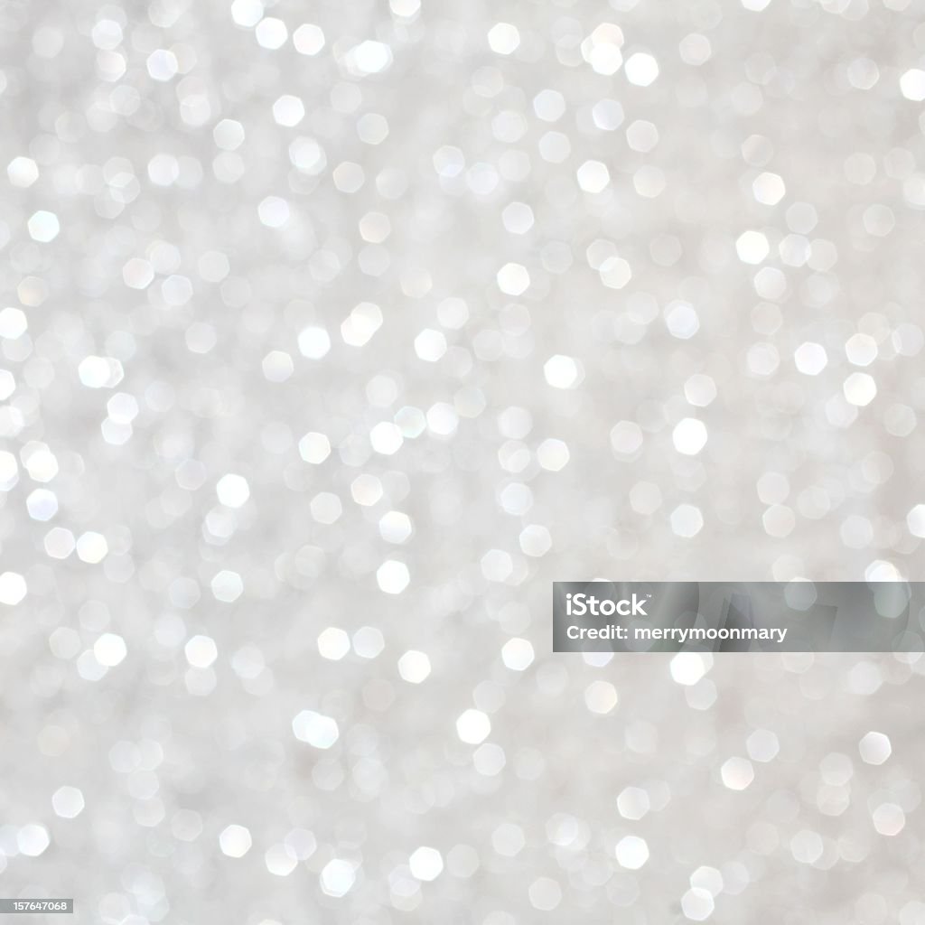 White Sparkles Square Format Square format white silver sparkles background.  Light and bright for a soft background.  defocused for texture and light effect.  Square version of my popular silver sparkle background series. Backgrounds Stock Photo