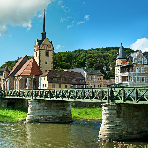 church and apartment building, one of the most photographed houses in Gera, district Untermhaus with river \