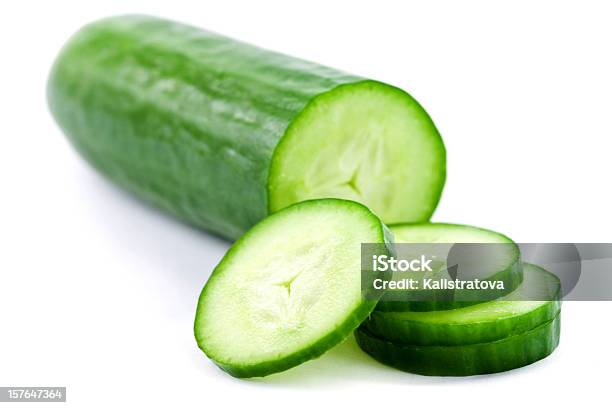 A Green Juicy Cucumber Sliced In White Background Stock Photo - Download Image Now - Color Image, Cucumber, Dieting