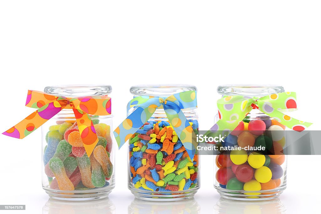 Barattoli di caramelle colorate - Foto stock royalty-free di Barattolo di vetro