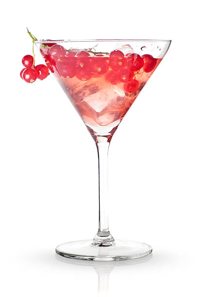 Red cocktail with cherries on white background Red Cocktail on a Martini glass and Red Currant isolated on white fruit garnish stock pictures, royalty-free photos & images