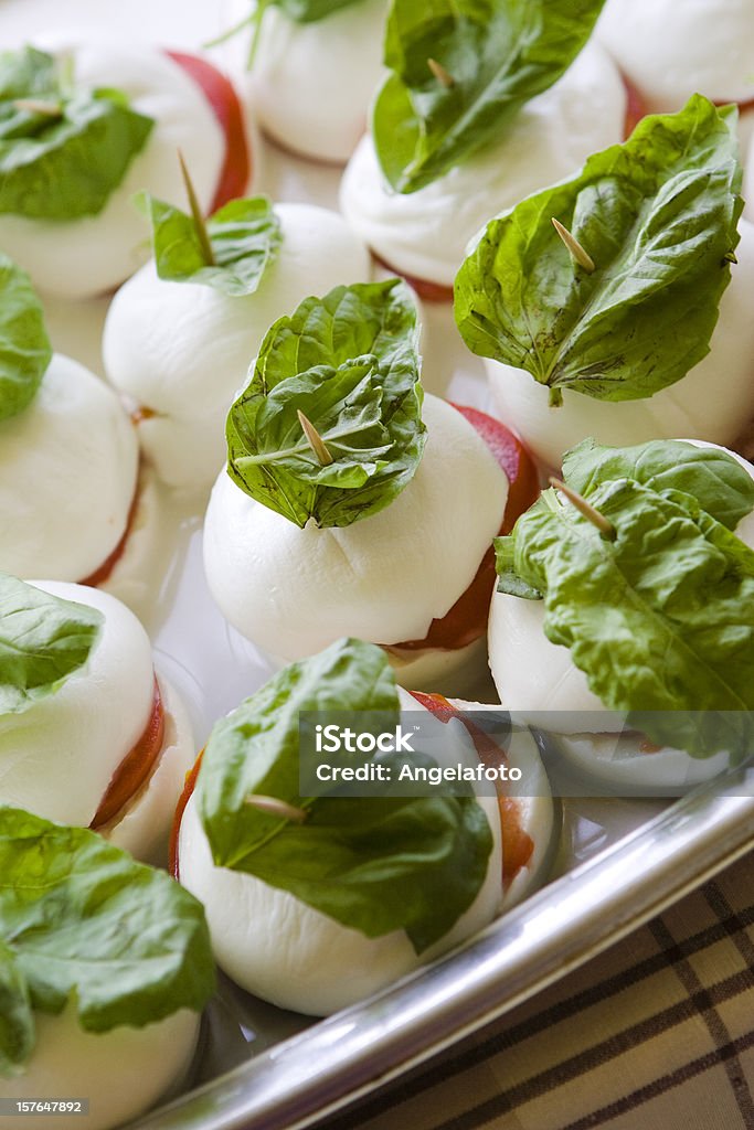 Mozzarella Cheese with Basil and Tomatoes  Braided Stock Photo