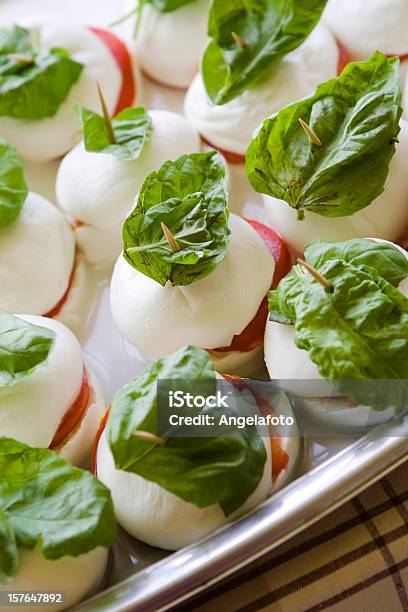 Mozzarella Cheese With Basil And Tomatoes Stock Photo - Download Image Now - Braided, Breakfast, Buffalo Mozzarella