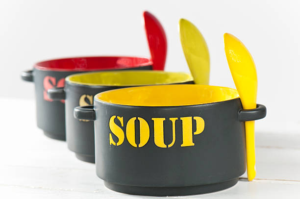 Colorful ceramic soup bowls on display. Kitchen decor, pastel dishware, and vibrant tableware with vintage flair