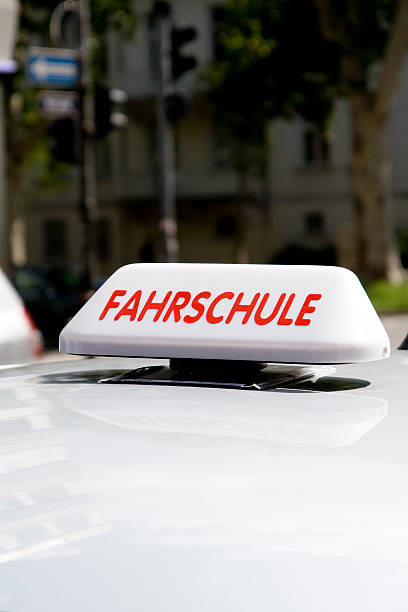 istock Fahrschule - german driving school sign closeup 157648556