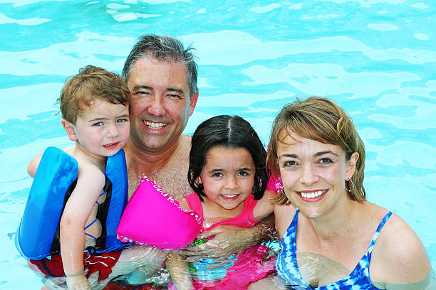istock Family Swimming 157648744
