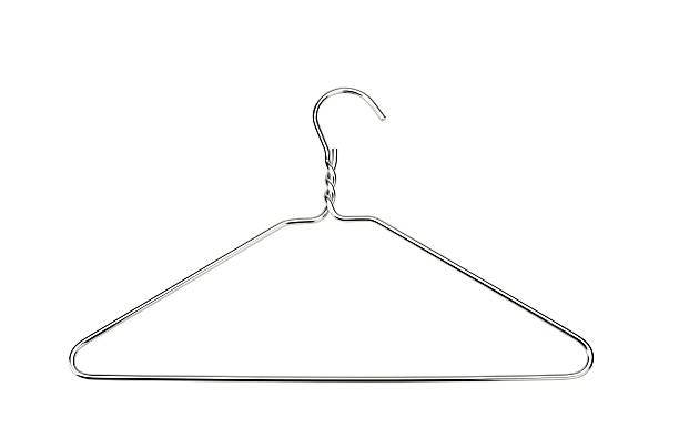 A single silver wire hanger on a white background A metal cloth hanger coathanger stock pictures, royalty-free photos & images