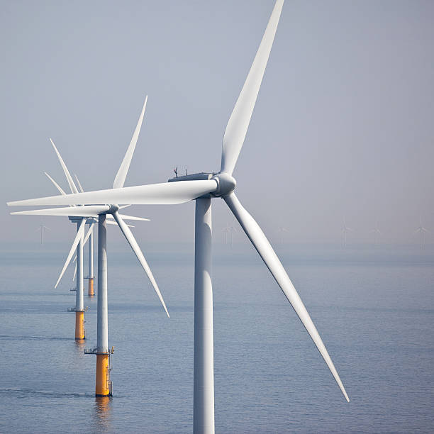 Series of off-shore wind turbines  floating electric generator stock pictures, royalty-free photos & images