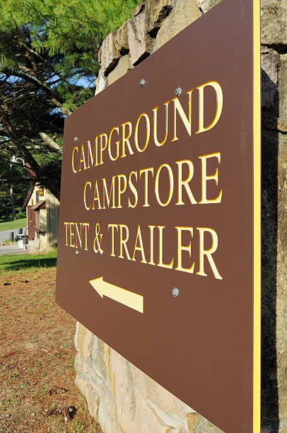 istock Campground store tent and trailer sign 157649361