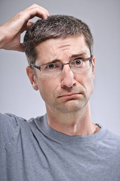 Man Scratching His Head stock photo