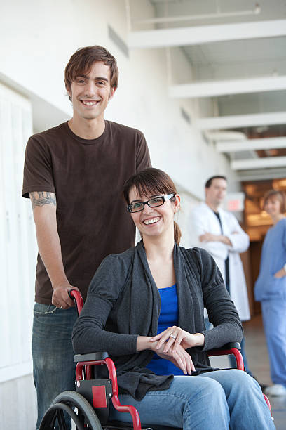 istock Hospital - Couple with wheelchair 157649629