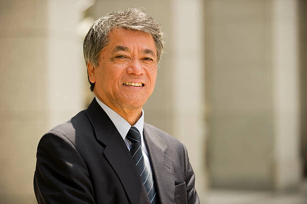 istock A senior businessman standing outdoors 157649750