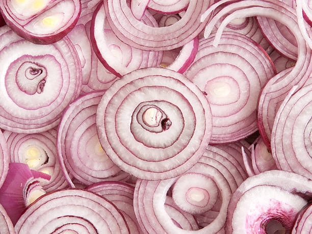 Red onion slices stock photo