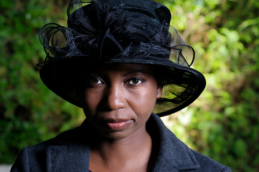 A Portrait Of An African American Woman In A Smart Black Hat. \n\n[url=http://istockpho.to/1y5WoQw][img class=mceItemIstockImage]http://images.eu.viewbook.com/85b5cc39c923dddd6f49da28b69dddcd.jpg [/img][/url]\n[url=http://istockpho.to/1y5WoQw]Click here for more of this model: Fanella[/url]