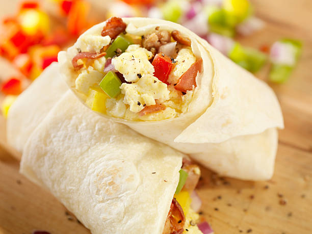 Breakfast Burrito with Scrambled Eggs  burrito stock pictures, royalty-free photos & images