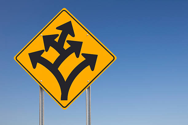 istock Division Branching Off Ahead Traffic Road Sign Post 157650258