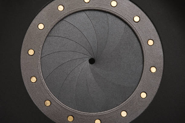 Photo of Circular Aperture with contacts. Сlose Up of a Spiral. Selective focus. Top view