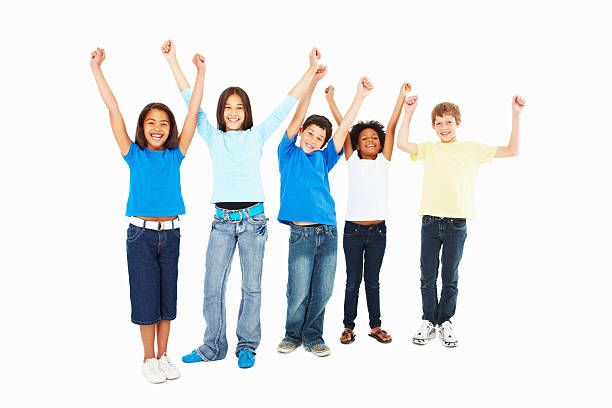istock Joyful kids standing in a line with hands raised 157650344