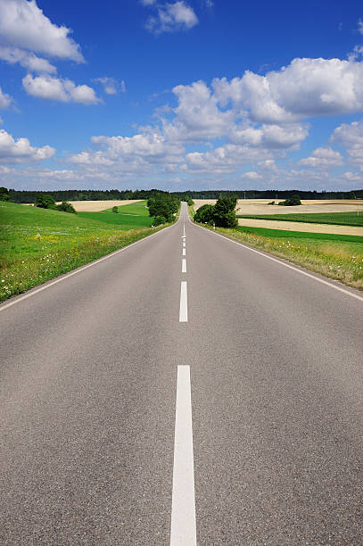 istock Straight road through colorful landscape 157650421