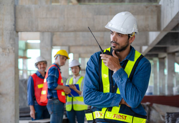 istock stressed engineer manager is gossiped or bullied from foreman team architect workers due to risk mistake 1576504380