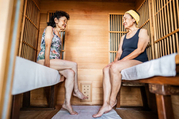 Senior women talking on a sauna at a resort