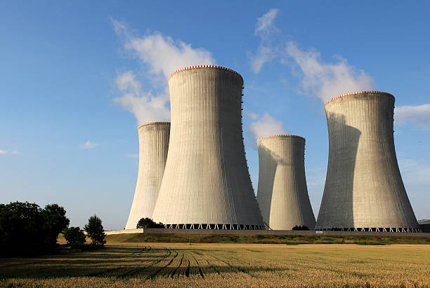 istock view of nuclear power plant towers 157651438