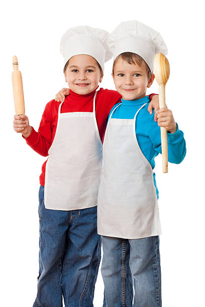 istock Little cooks with ladle and rolling pin 157651461