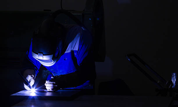 TiG Welder Welder using TiG welding technique to join metal. FL-photography stock pictures, royalty-free photos & images