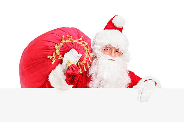 istock Santa Claus carrying bag behind a panel 157653100