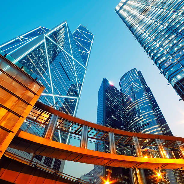 istock Looking up at modern sky scrapers in Hong Kong 157654058