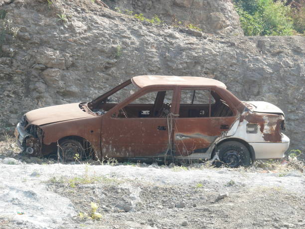 istock an old car at junkyard 1576540844