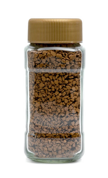 istock Instant coffee powder in glass bottle isolated on white background 1576543723