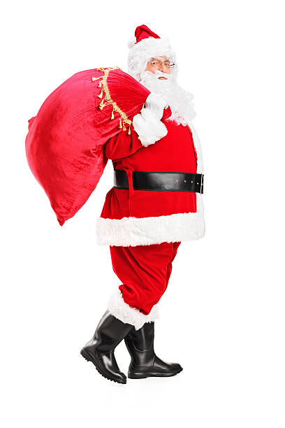 istock Santa Claus walking with bag on his back 157656667