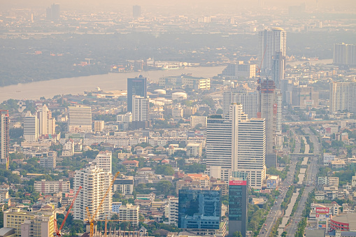 Bangkok, Thailand - Dec. 27, 2018: Air pollution from Lots of dust or PM2.5 particle exceeds the standard at Bangkok city, Thailand. Negative effect on Respiratory system and health.