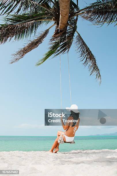 Swing In Tropical Paradise Stock Photo - Download Image Now - Adult, Adults Only, Barefoot